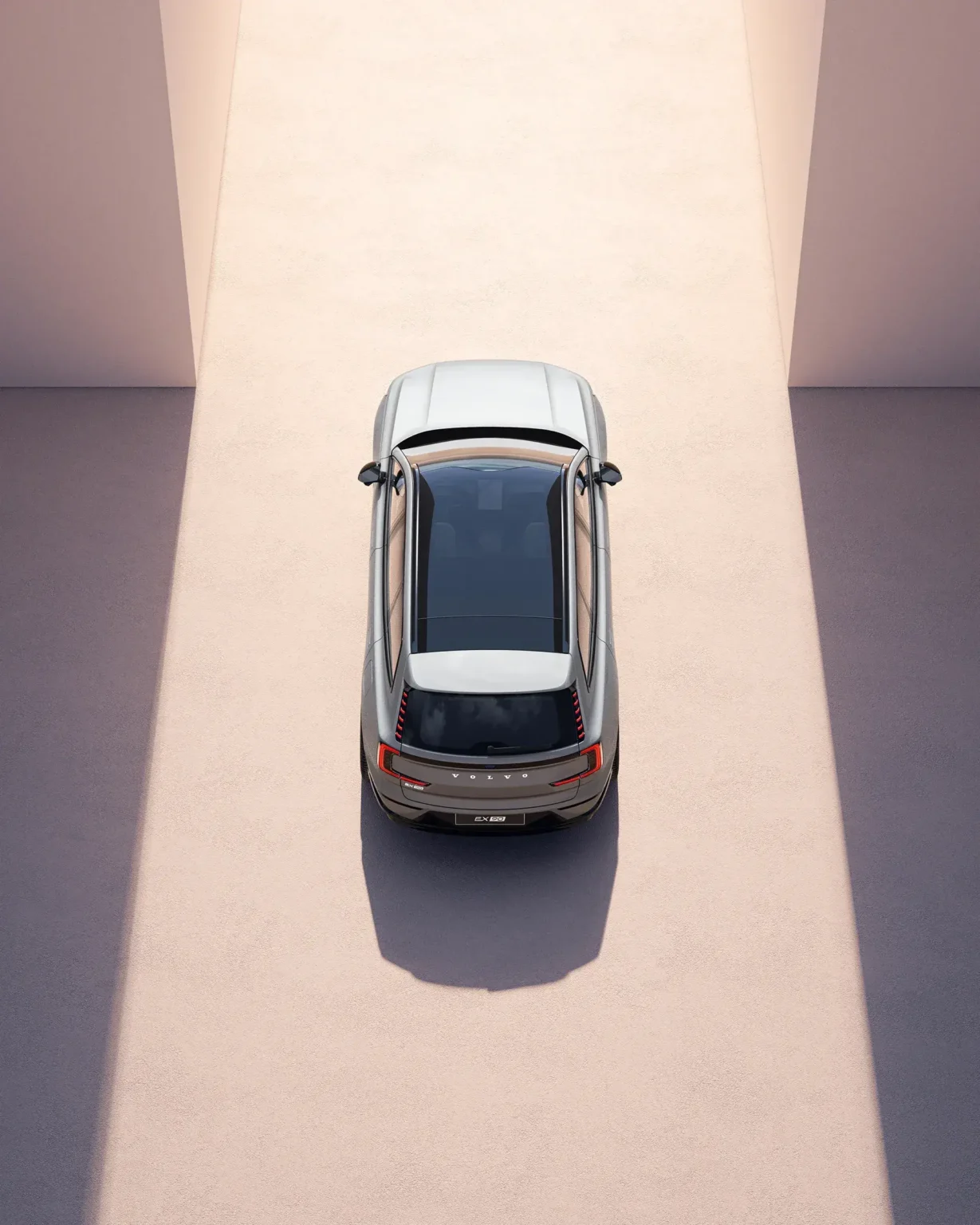 Volvo EX90 seen from directly above, showing its full-length glass roof
