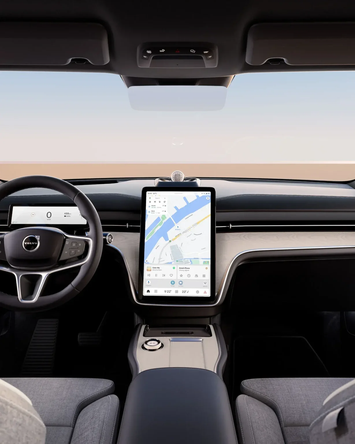 Volvo EX90 dashboard seen from the back seat, with the driver display and centre screen