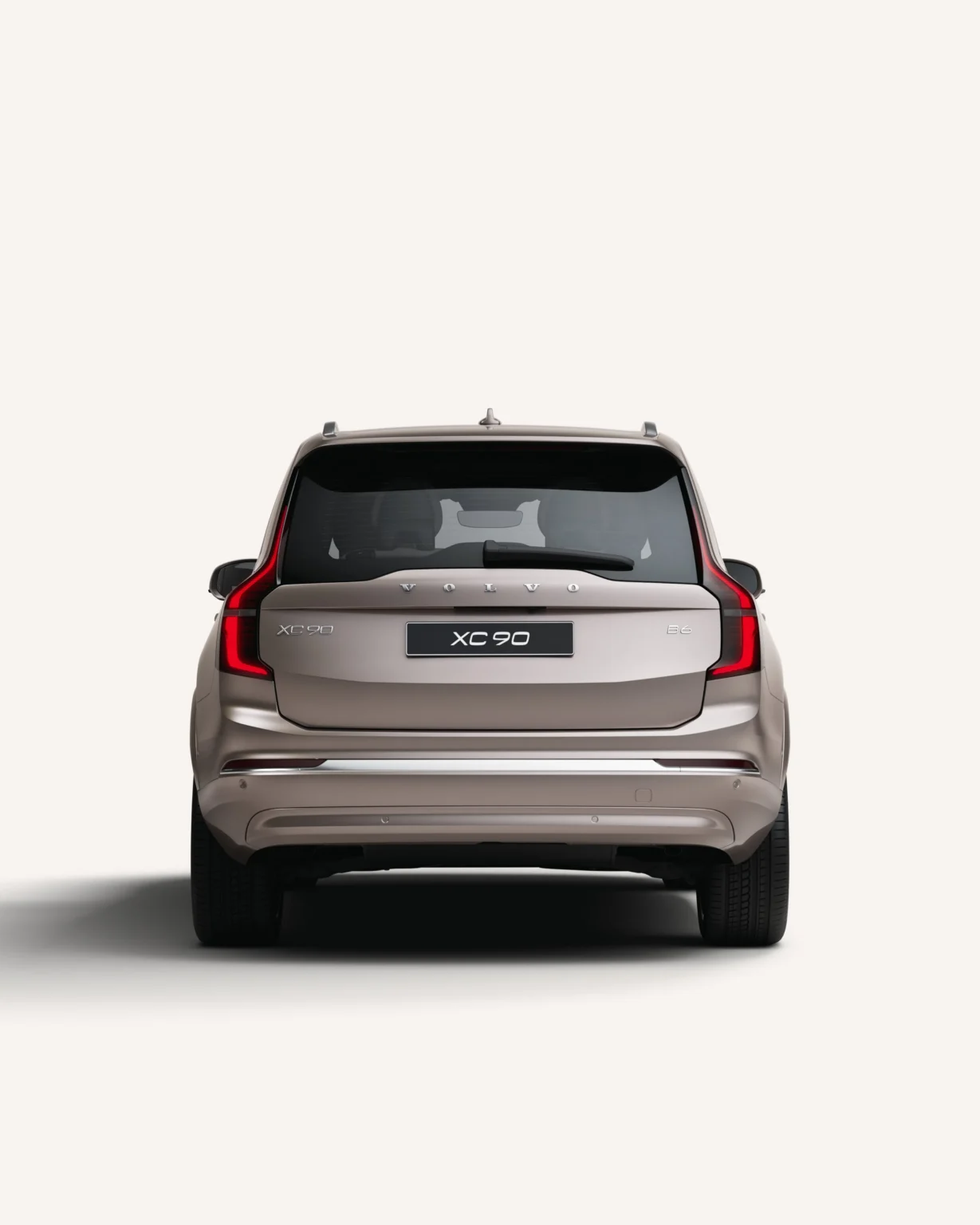 Volvo XC90 from behind in a white studio