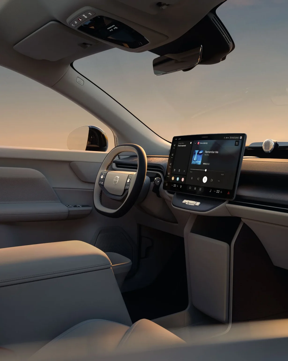 Volvo EX60 cockpit with the steering wheel, driver display and centre display