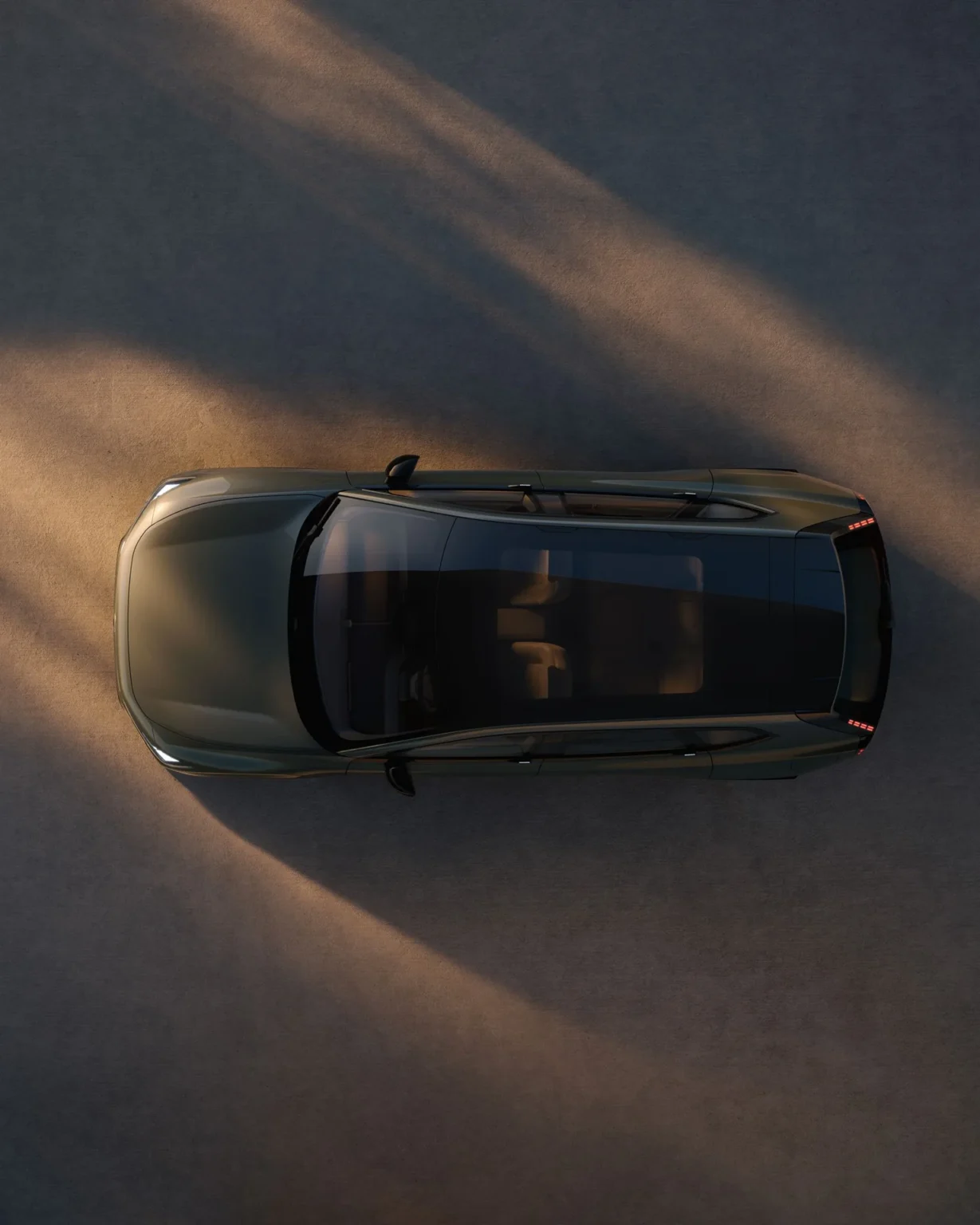 Top-down view of a Volvo EX60 at dusk