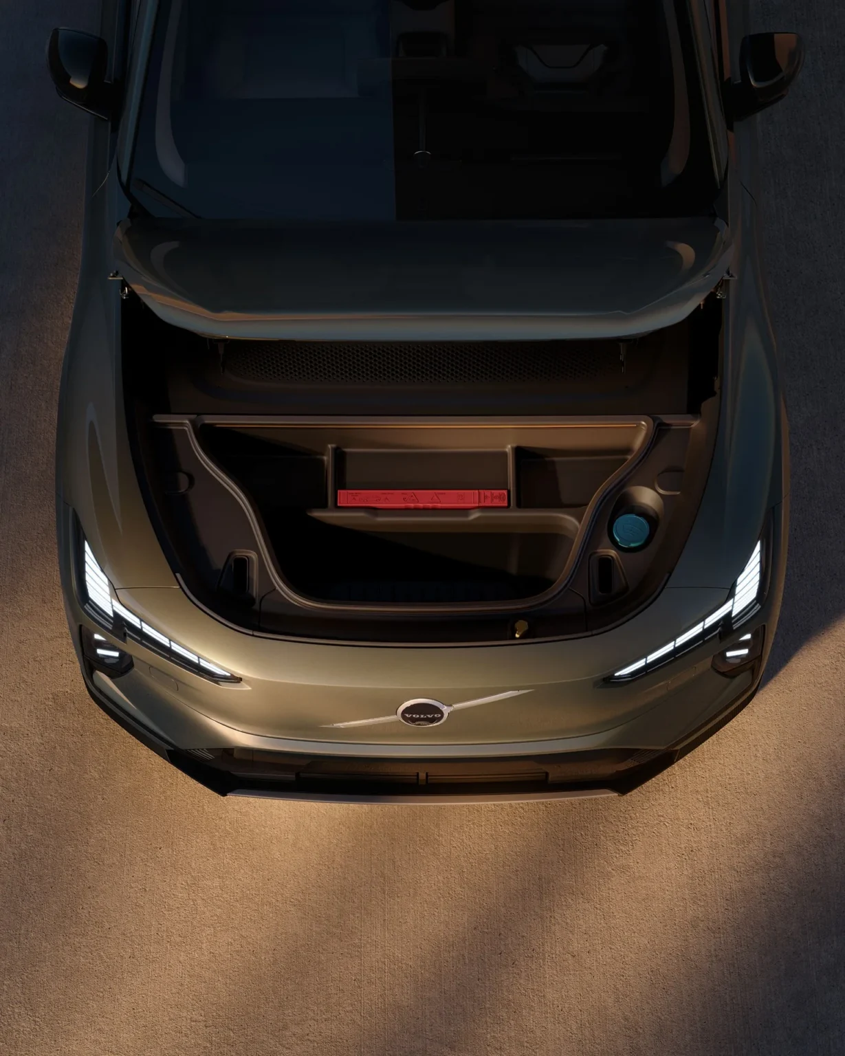 Volvo EX60 seen from above with the front load compartment open