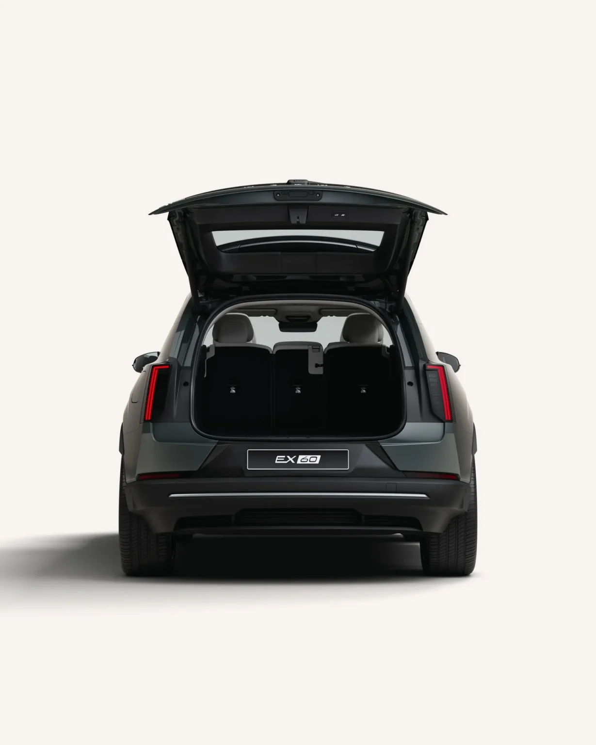 Rear view of a Volvo EX60 with the tailgate open, showing the boot