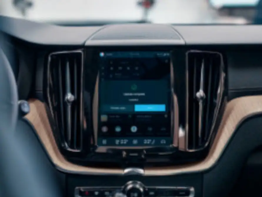 The portrait centre touchscreen of a Volvo showing a software update