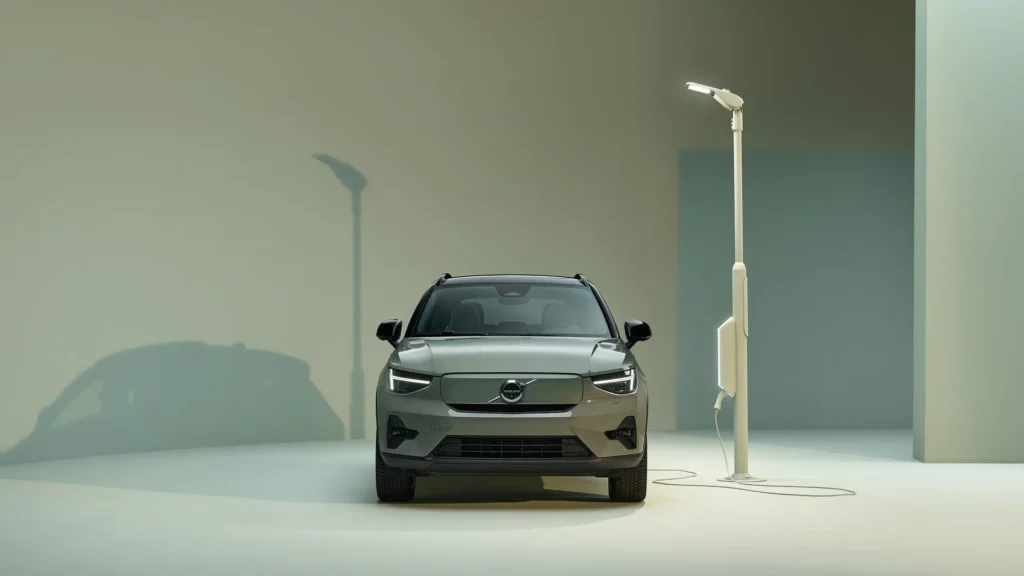 Front of a Volvo XC40 Recharge plugged into a charging point