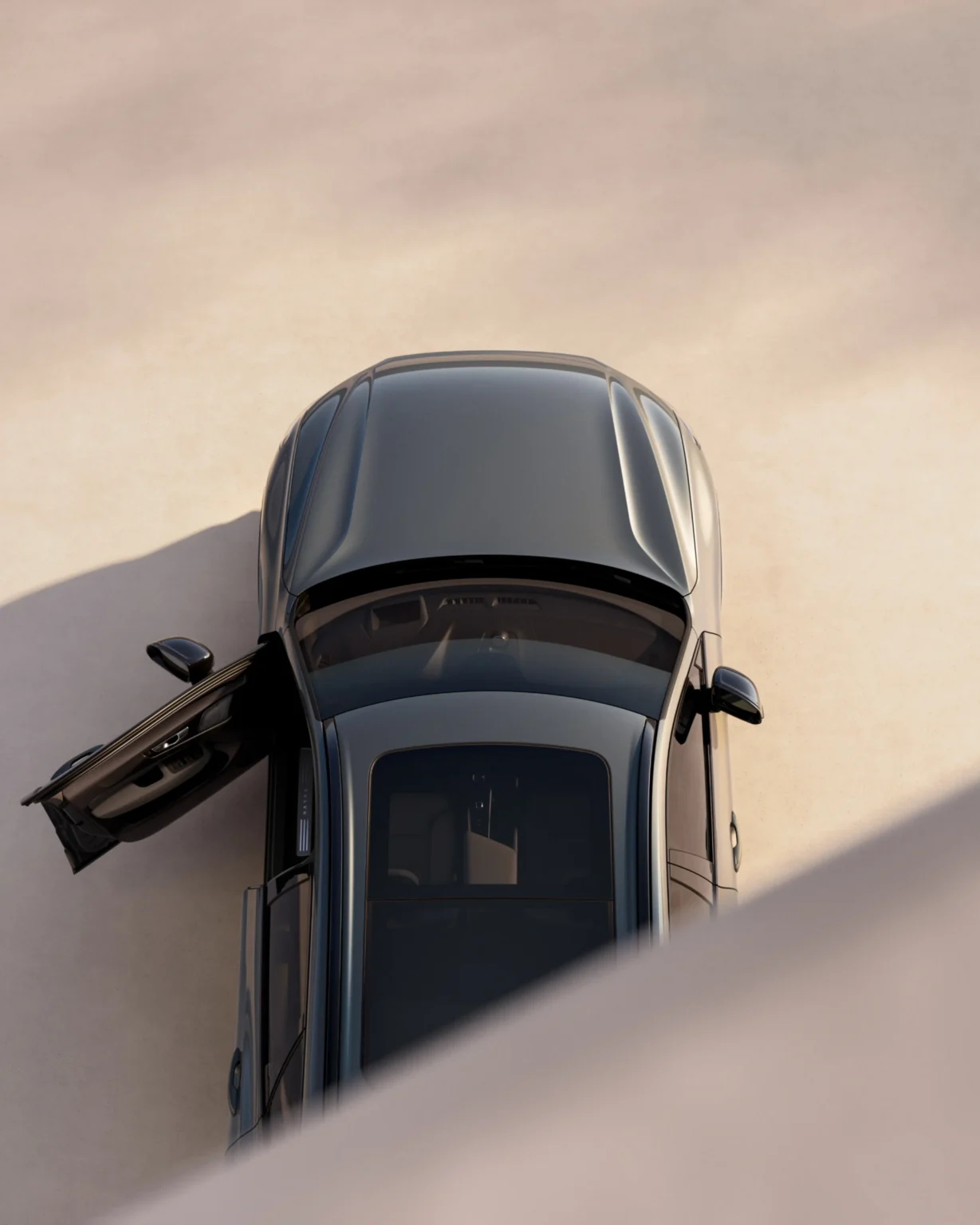 Volvo XC60 seen from above with the driver's door open