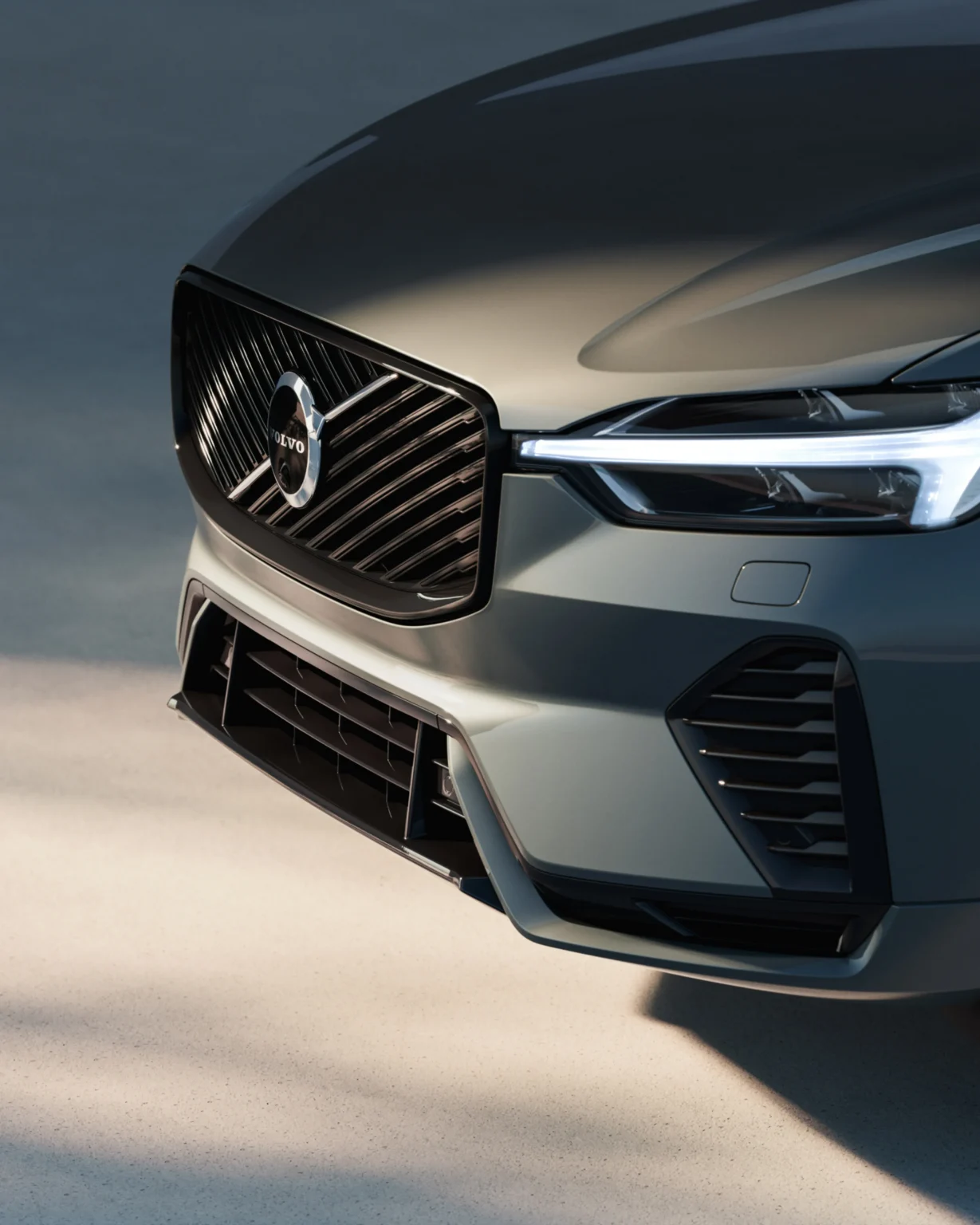 Close-up of the Volvo XC60 grille and slim LED headlight