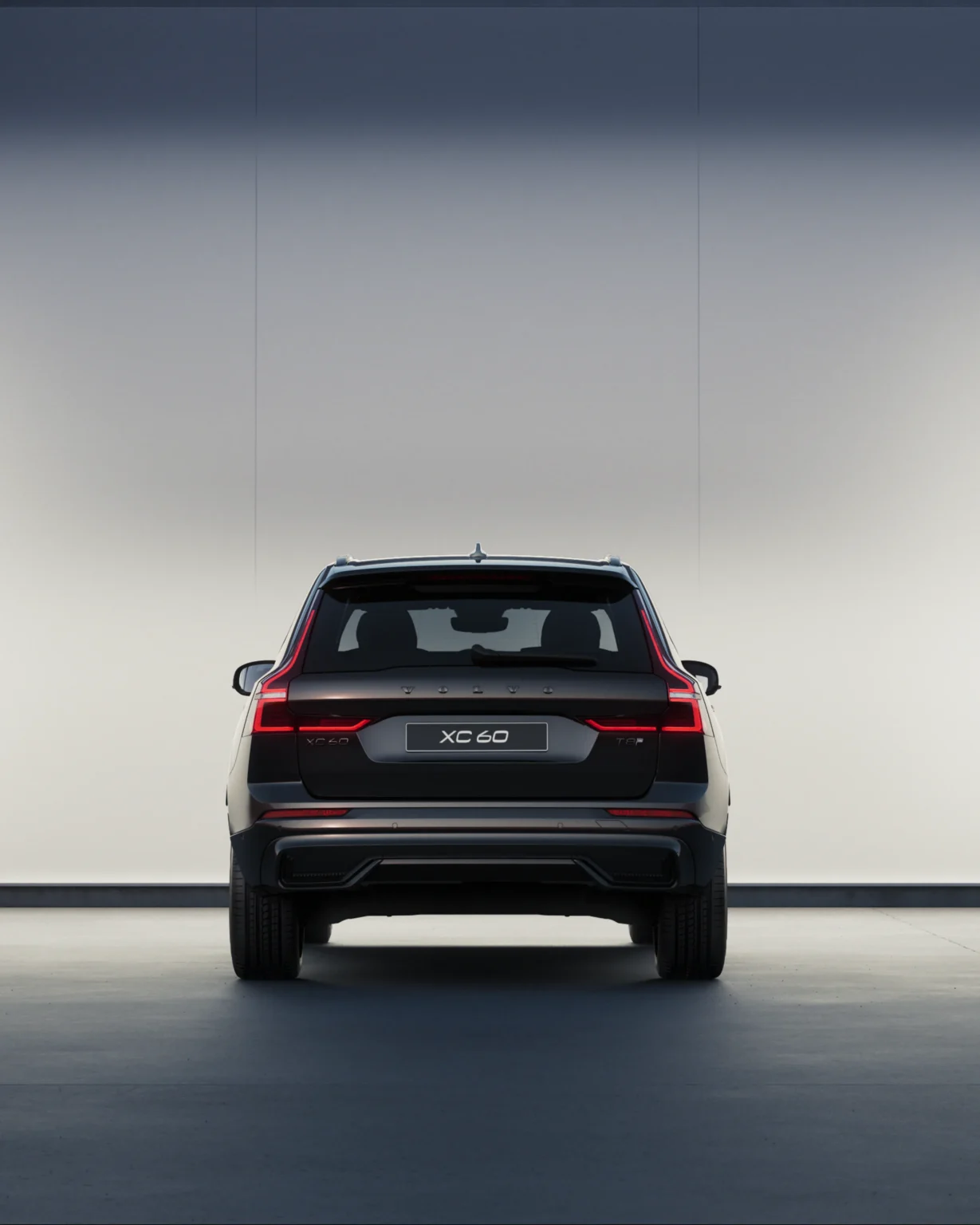 Volvo XC60 Black Edition from behind, showing its gloss black details