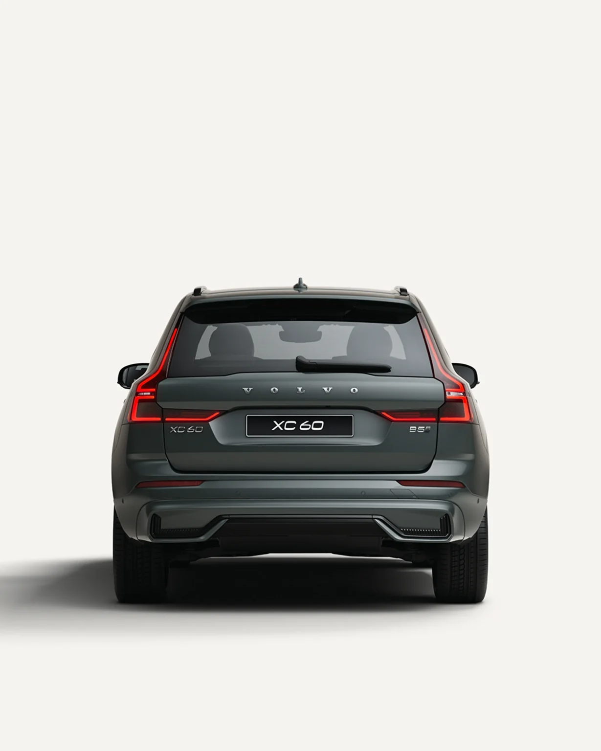 Volvo XC60 from behind in a white studio