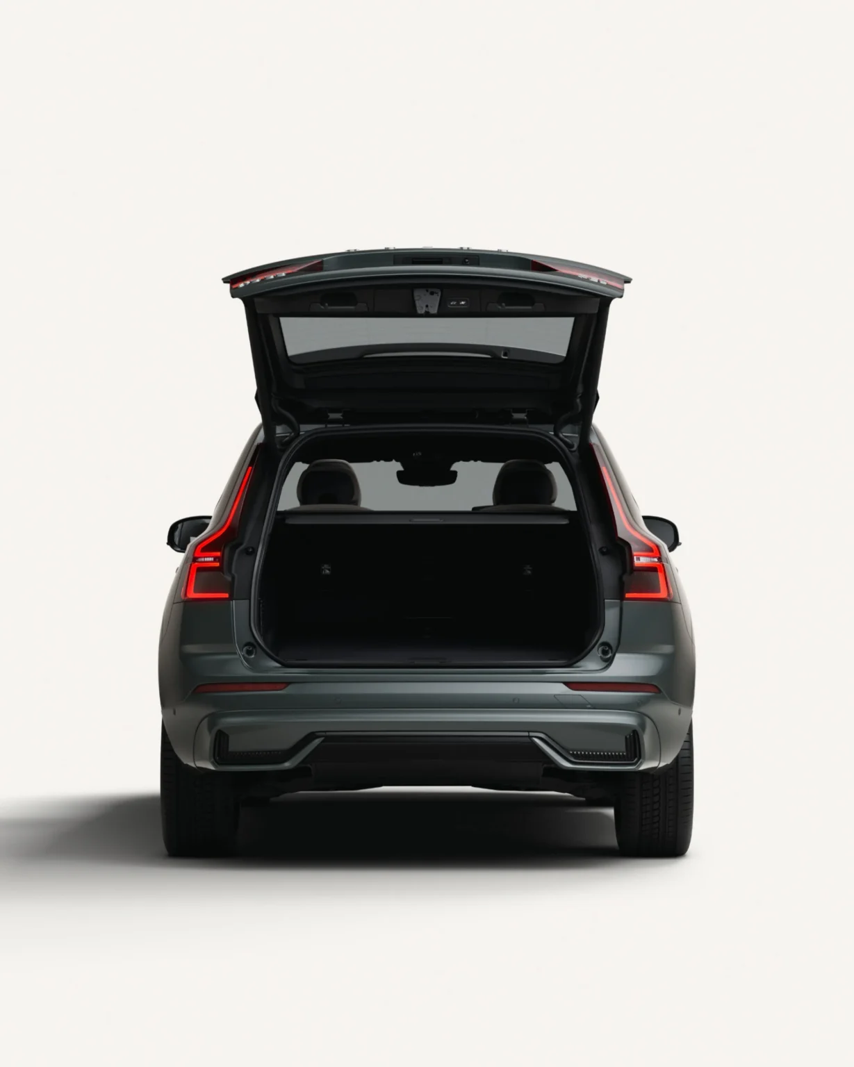 Volvo XC60 from behind with the tailgate open, showing the boot