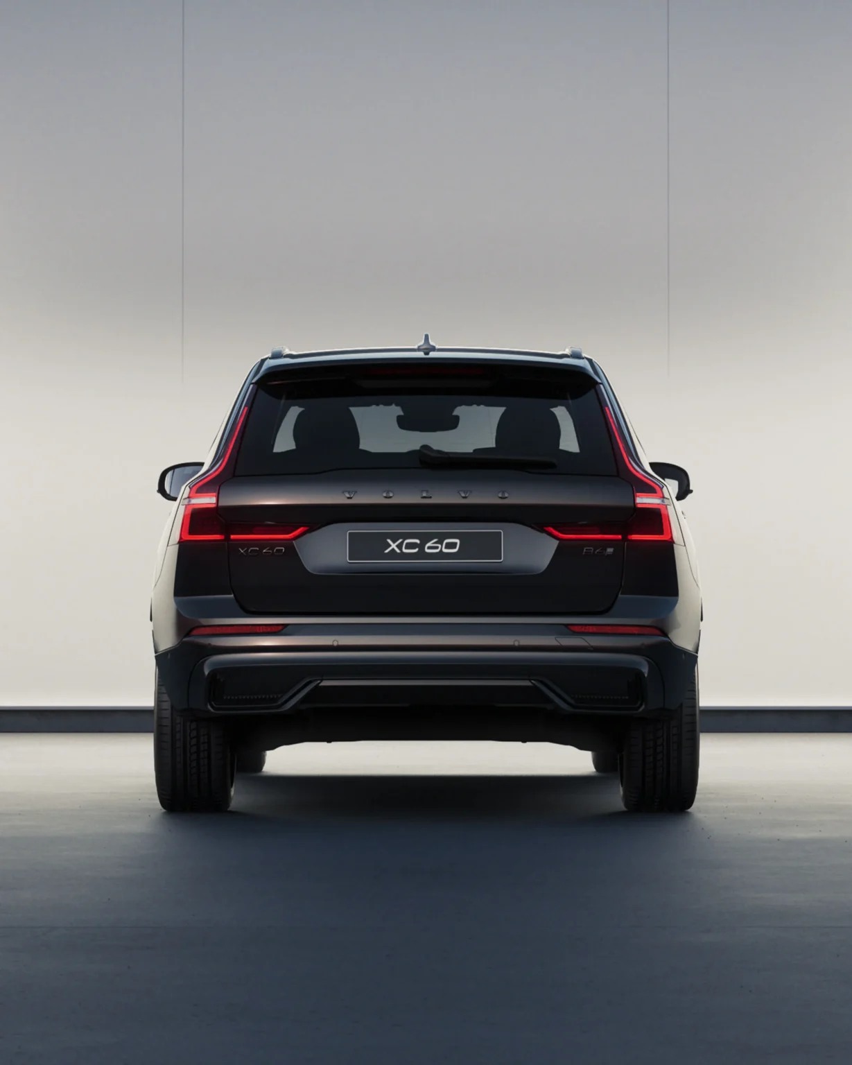 Volvo XC60 Black Edition from behind, showing its gloss black details